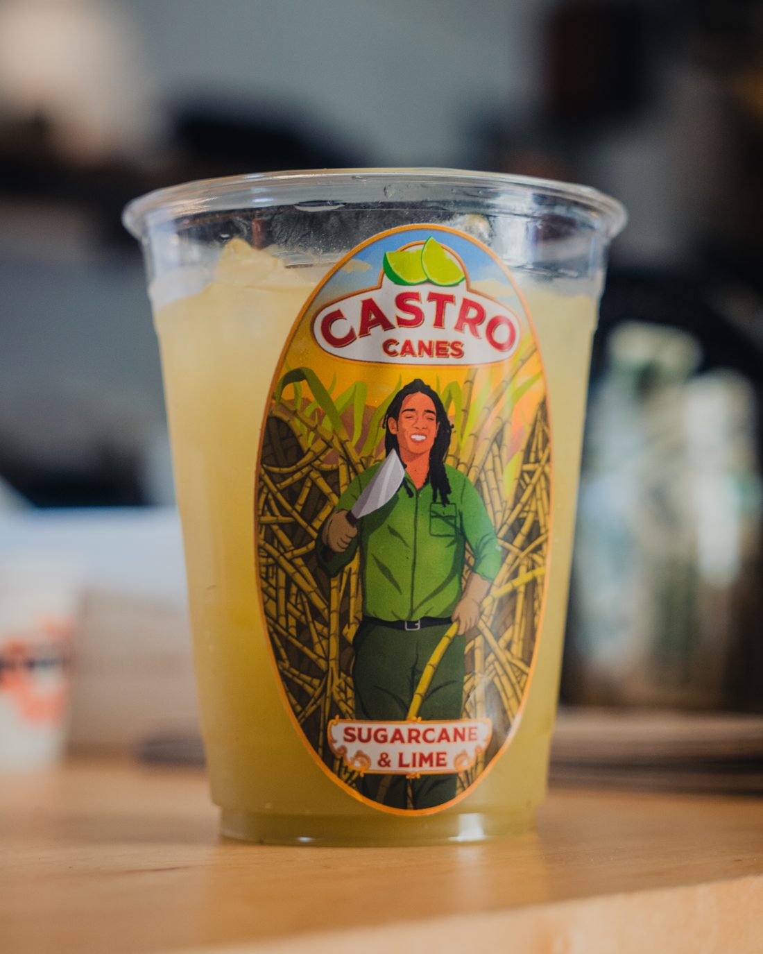 A finished cup of sugarcane and lime juice